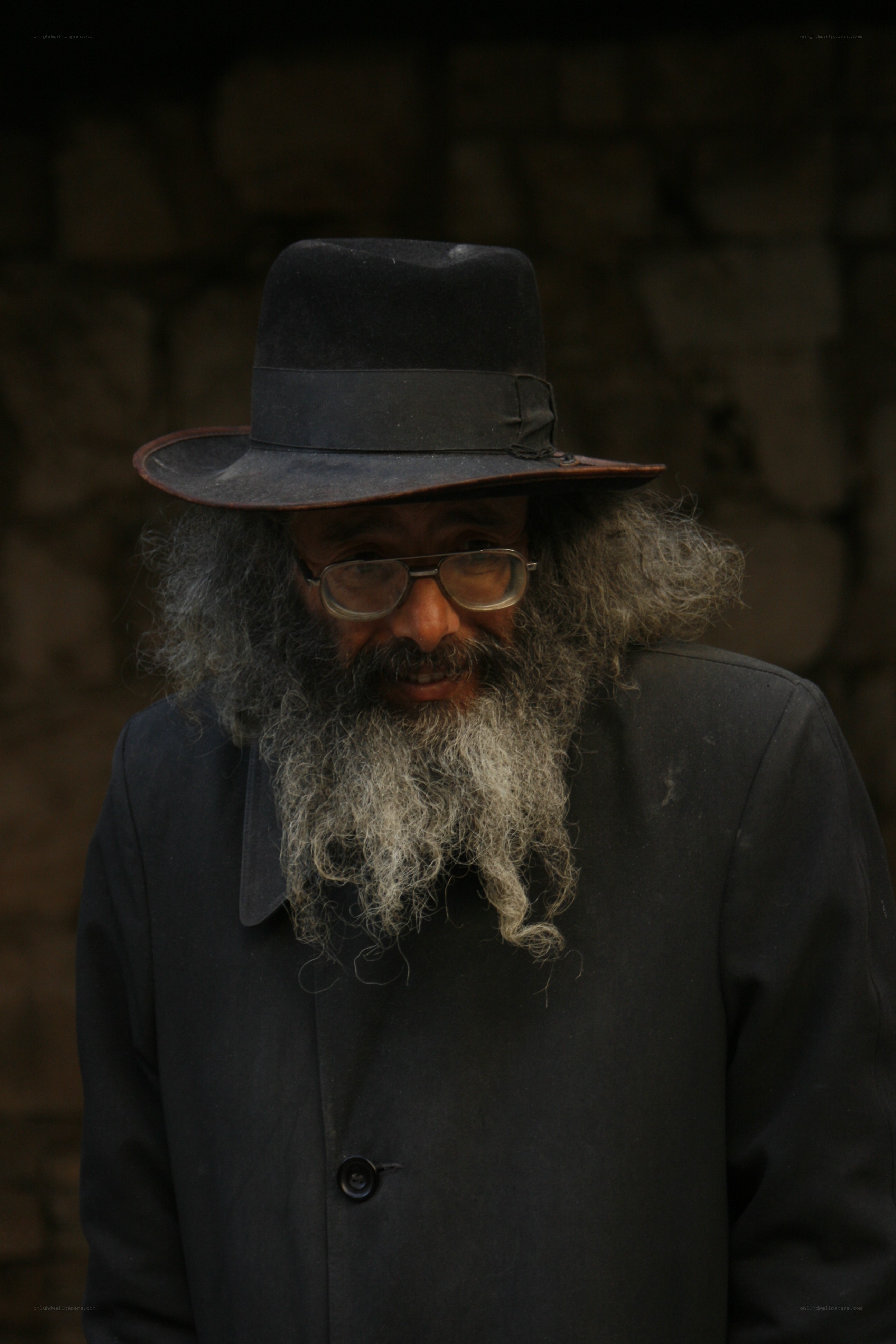 man with long beard and hat
