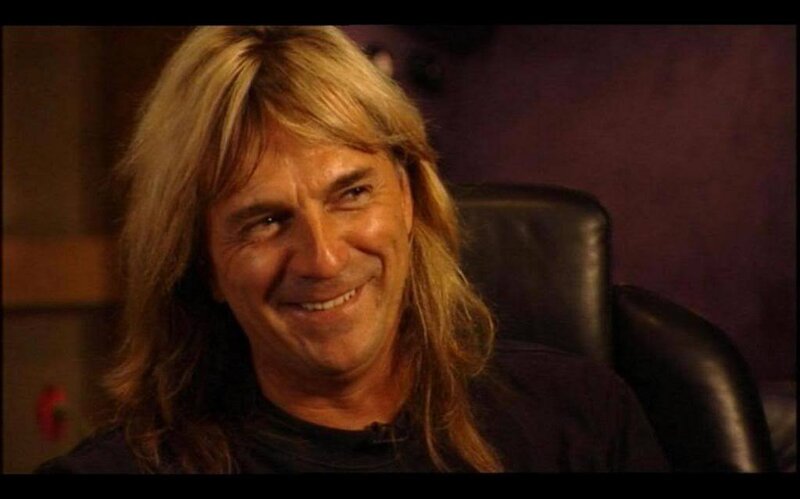 Man with Long Blonde Hair — Brown, Relaxed