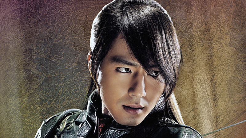 Man with Long Dark Hair — Brown