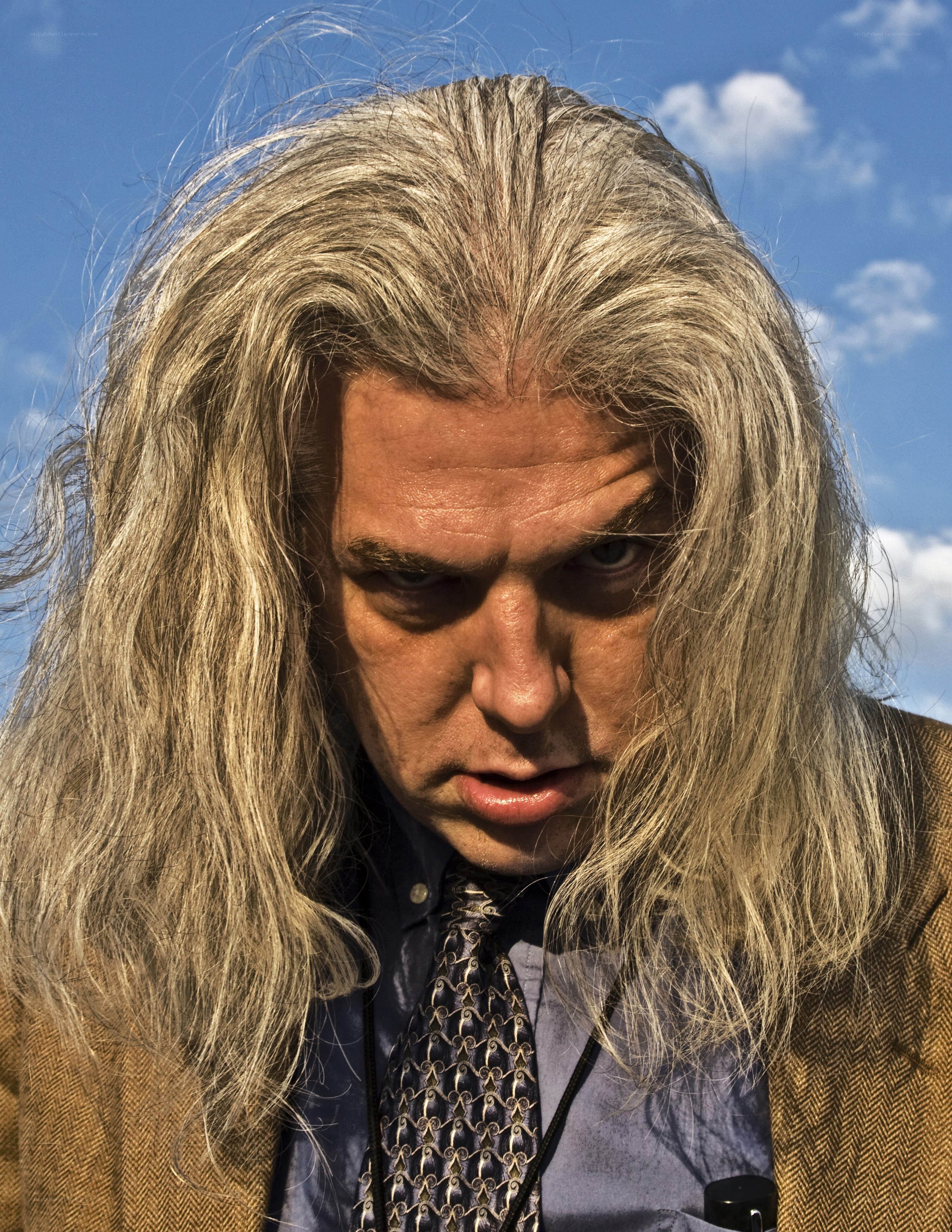 man with long gray hair