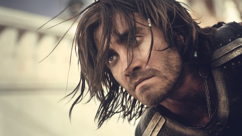 man with long hair and armor