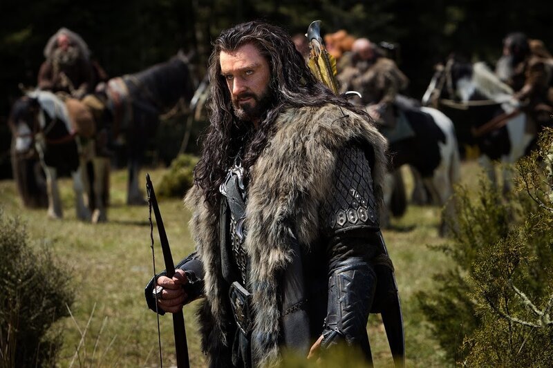 Man with Long Hair and Bow