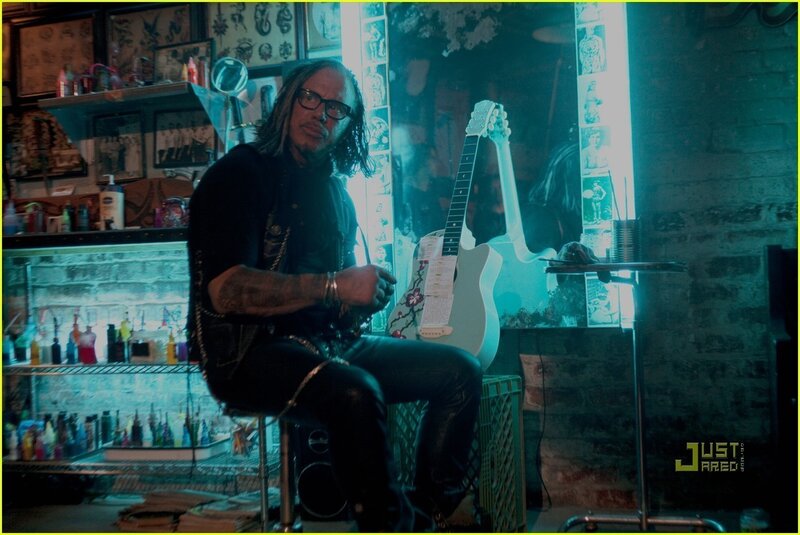 Man with Long Hair and Glasses