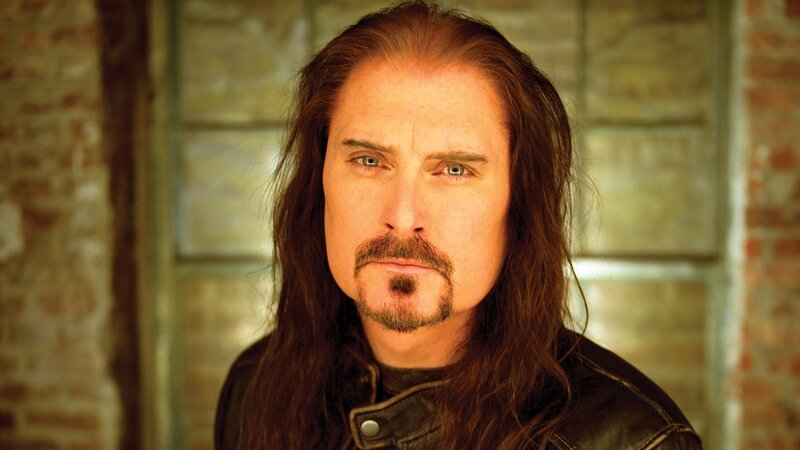 man with long hair and mustache