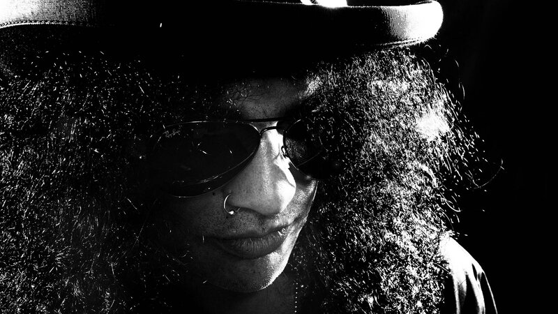Man with Long Hair and Sunglasses — Black, Dramatic