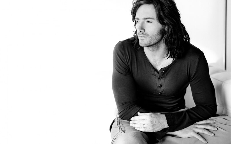 Man with Long Hair — Black, Contemplative, Photograph, Shirt