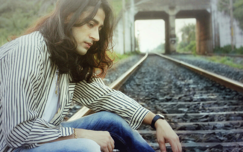 Man with Long Hair — Blue, Contemplative, Afternoon