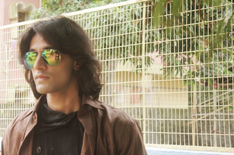Man with Long Hair — Brown, Contemplative, Afternoon