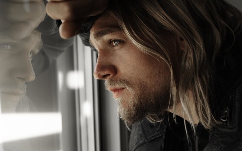 Man with Long Hair — Brown, Contemplative, Photograph, Reflection