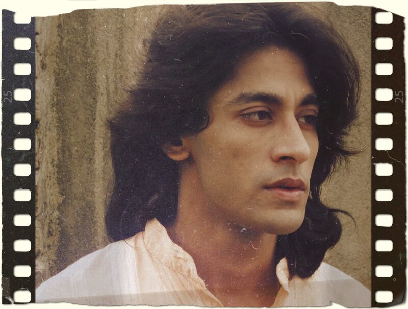 Man with Long Hair — Brown, Contemplative, Photograph