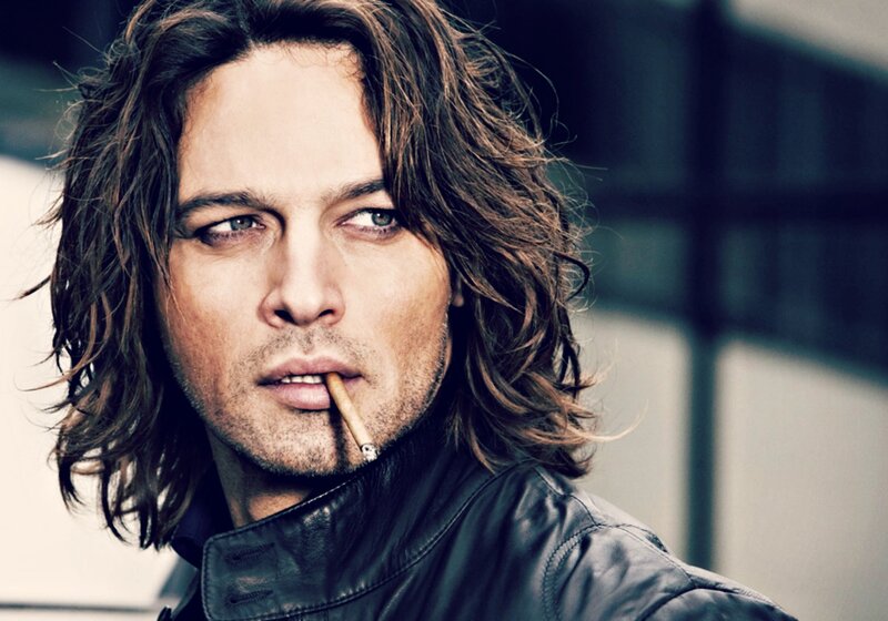 Man with Long Hair — Brown, Serious, Photograph, Cigar