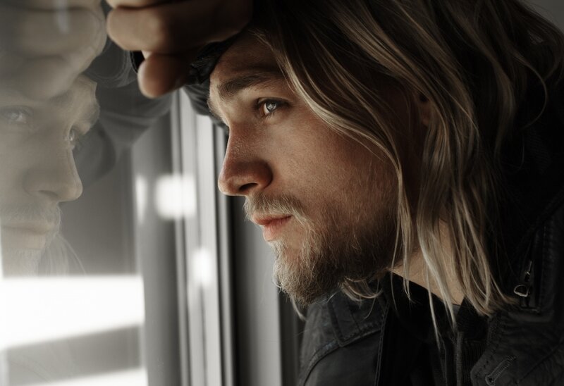 Man with Long Hair — Gray, Contemplative