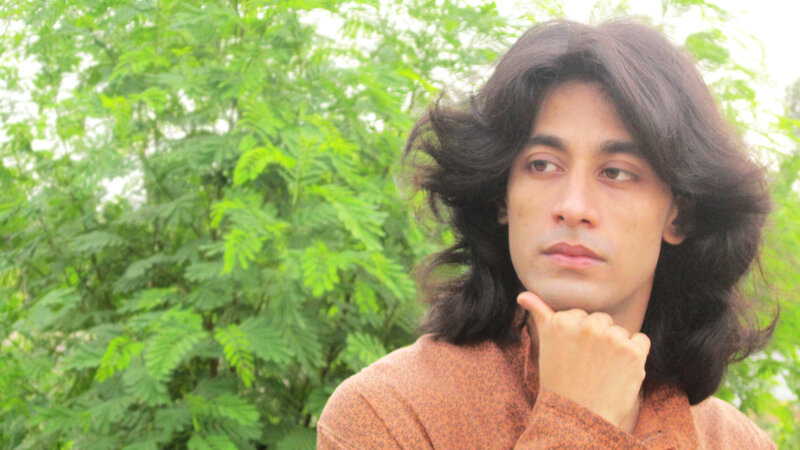 Man with Long Hair — Green, Contemplative, Afternoon