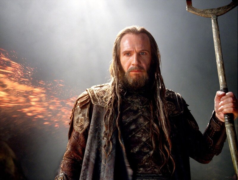 man with long hair holding a trident