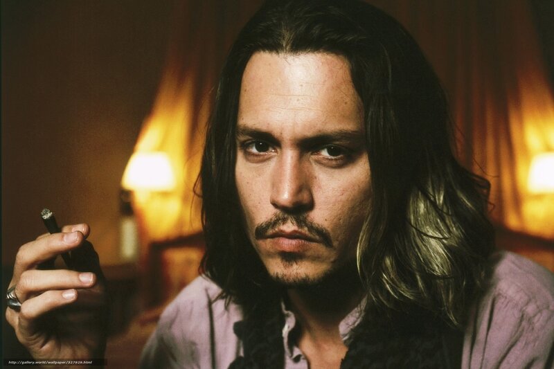 Man with Long Hair Holding Cigarette — Brown