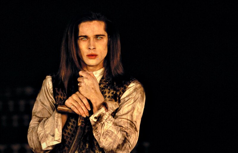 Man with Long Hair Holding Sword — Black, Dramatic, Photograph