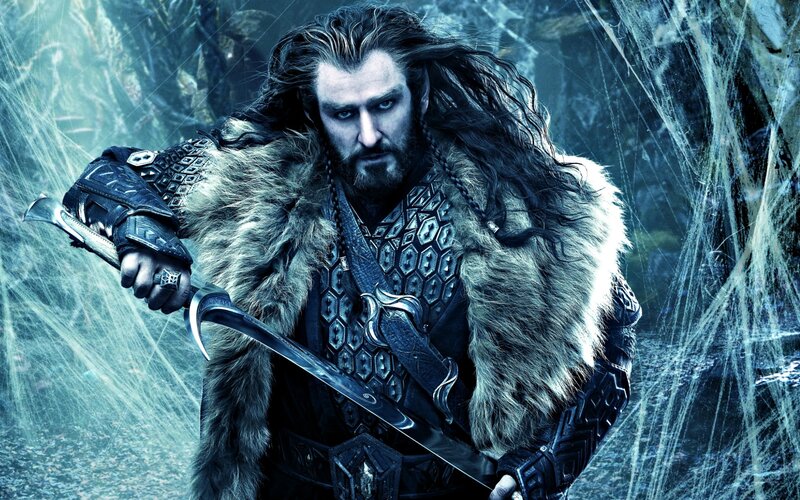 Man with Long Hair Holding Sword — Blue, Dramatic, Photograph