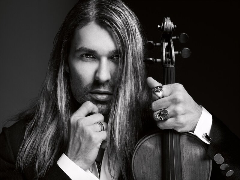 Man with Long Hair Holding Violin