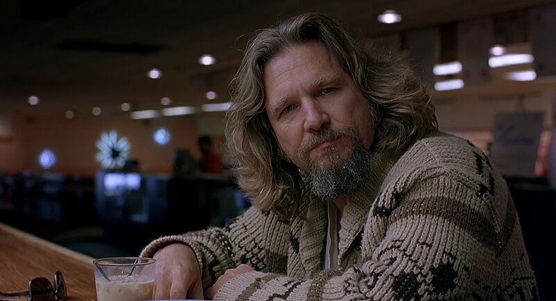 man with long hair in diner