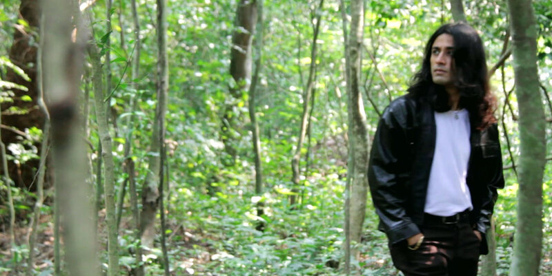 Man with Long Hair in Forest — Green