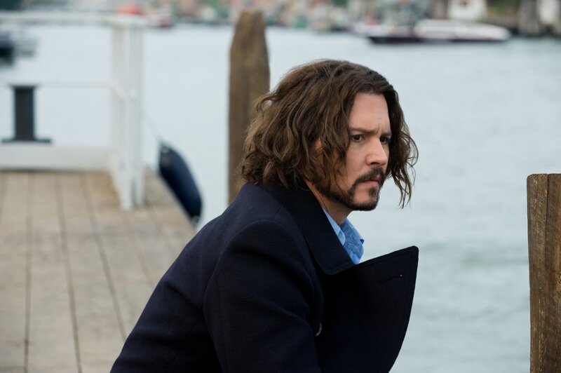 Man with Long Hair on Dock