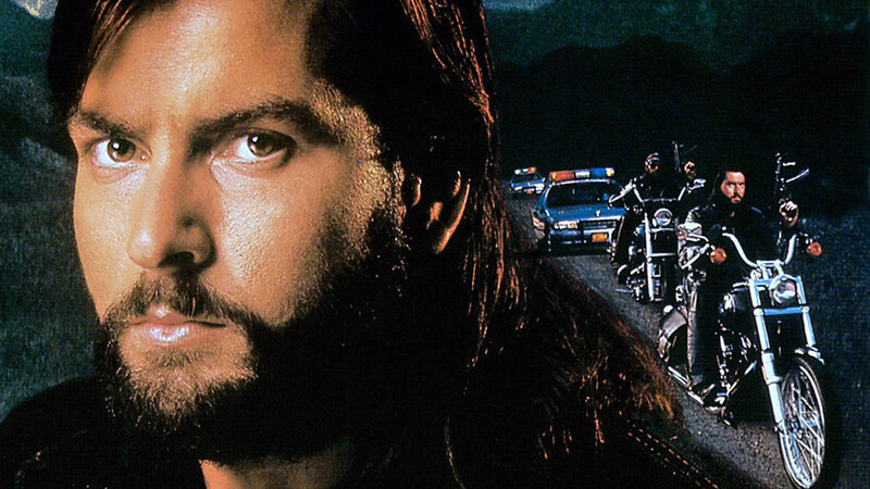 Man with Long Hair on Motorcycle — Black