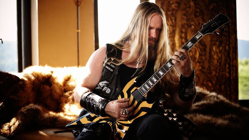 Man with Long Hair Playing Guitar — Black, Dramatic