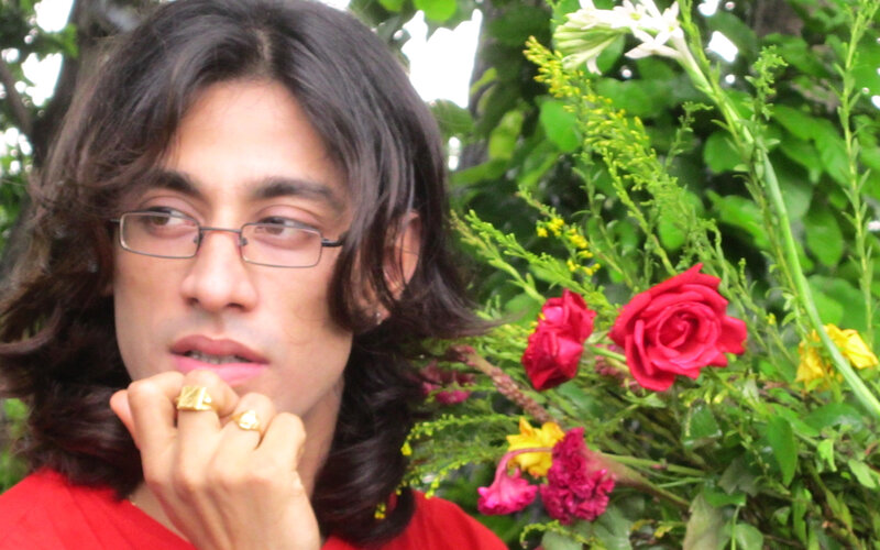 Man with Long Hair — Red, Contemplative