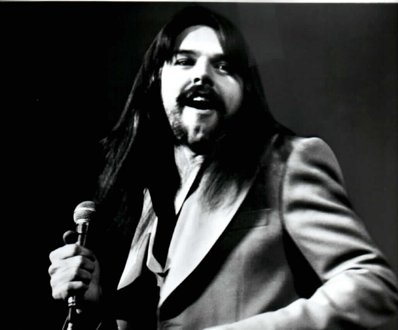 Man with Long Hair Singing — Black, Dramatic
