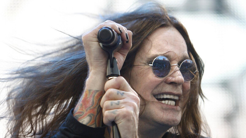 Man with Long Hair Singing — Brown