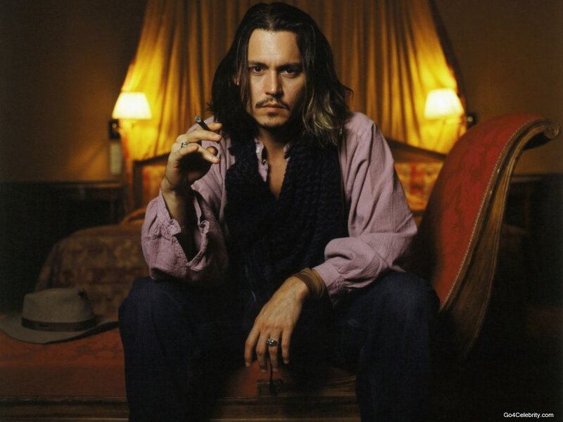 Man with Long Hair Sitting — Brown, Dramatic