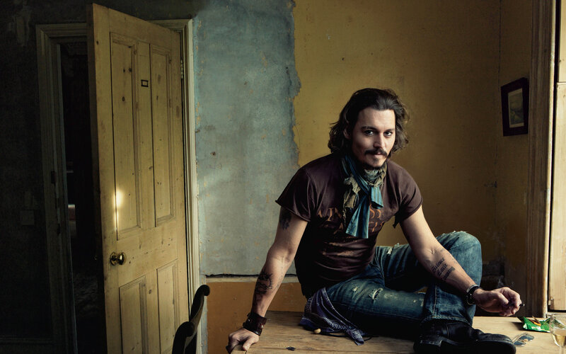 Man with Long Hair Sitting — Brown