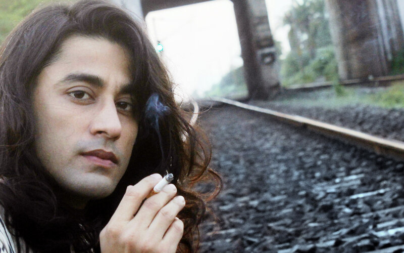 Man with Long Hair Smoking