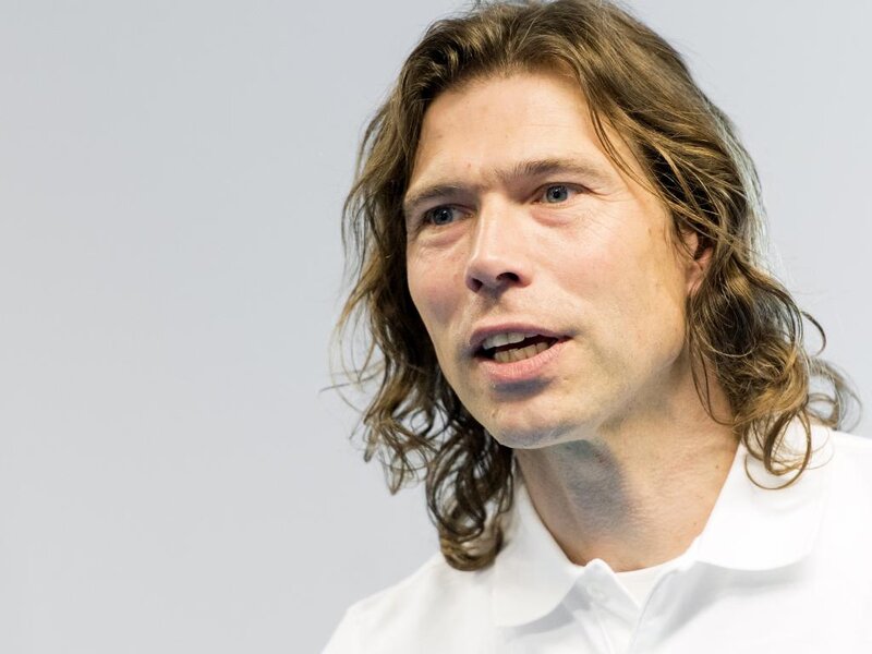 Man with Long Hair — White, Neutral, Photograph, White Shirt, Light Background