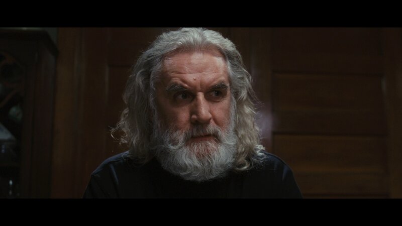 man with long white hair