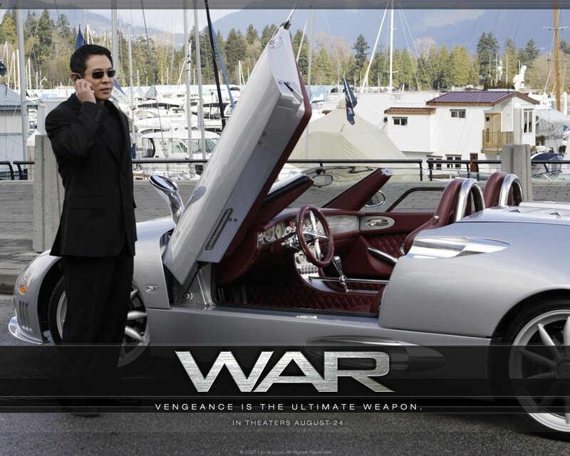 Man with luxury car at marina