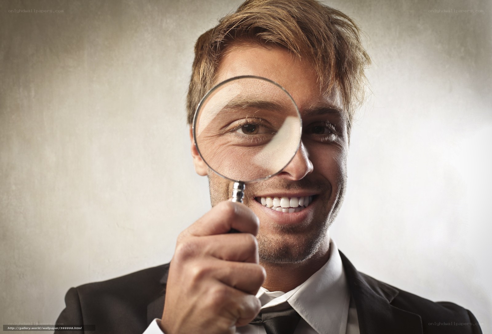 man with magnifying glass