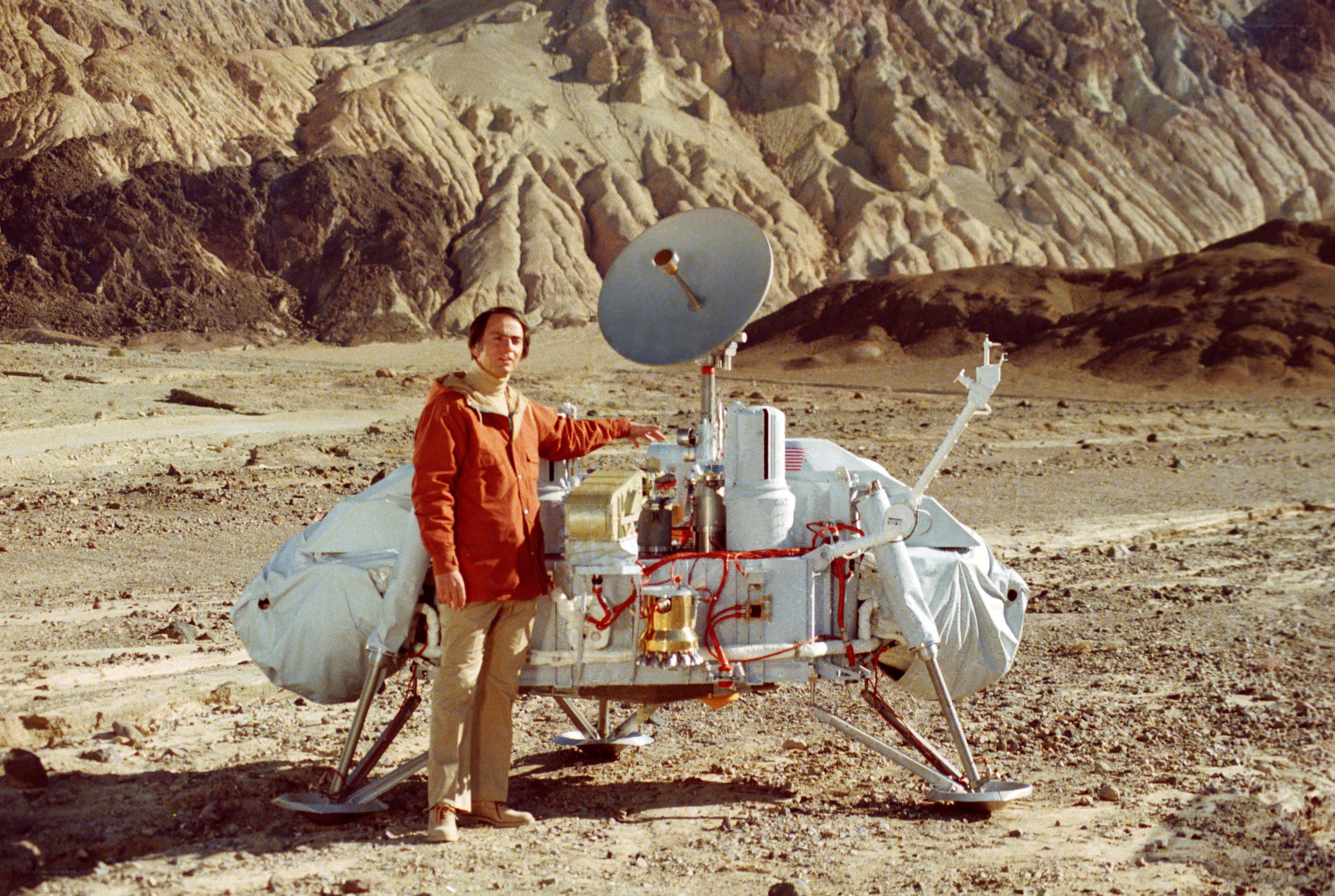 Man with Mars lander model