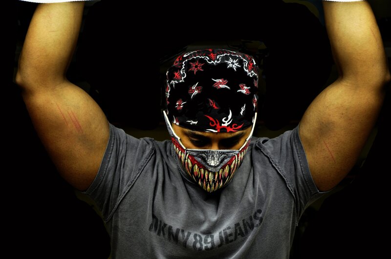 Man with mask and bandana