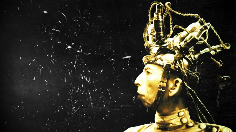 man with mechanical head contraption