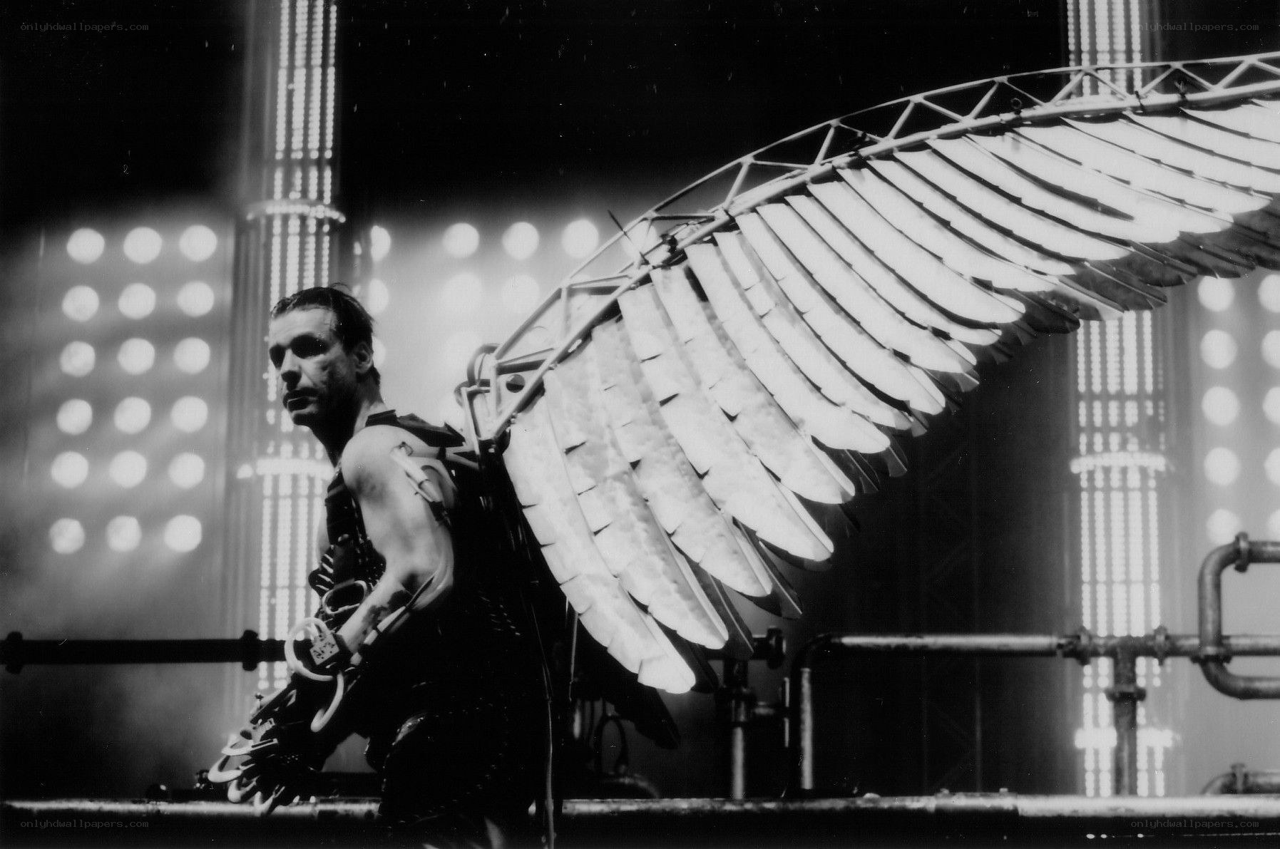 Man with mechanical wings on stage