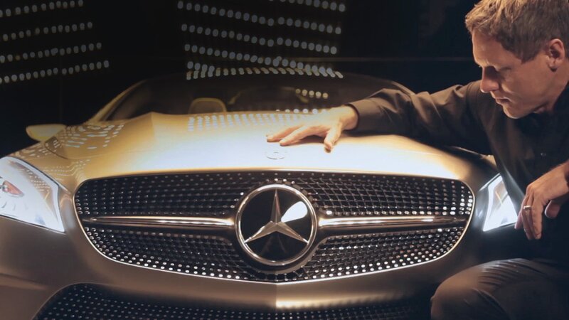 Man with Mercedes-Benz car