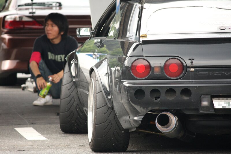 Man with modified car