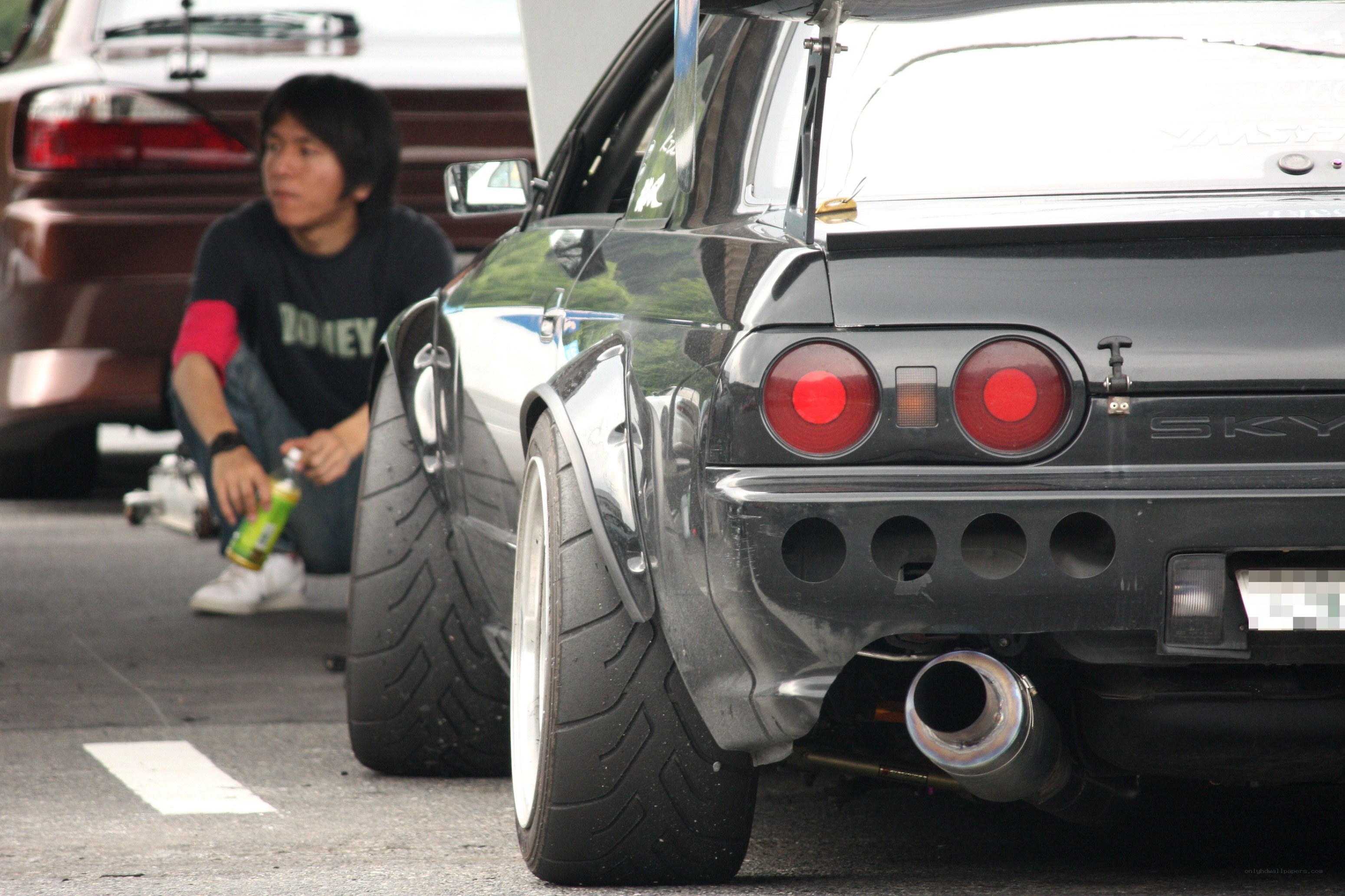 Man with modified car