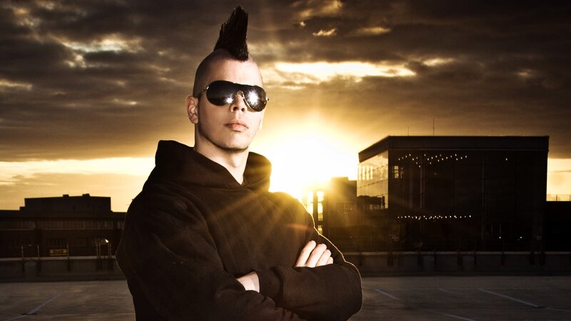 man with mohawk at sunset