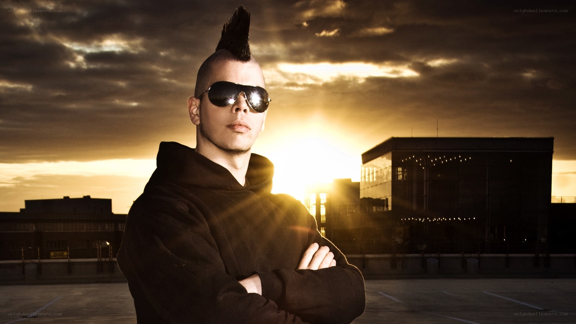 man with mohawk at sunset