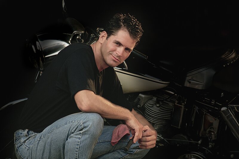 Man with Motorcycle — Black, Dramatic, Photograph