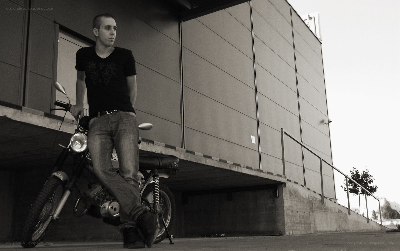 man with motorcycle on ramp