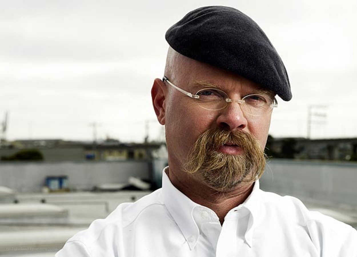 man with mustache and beret