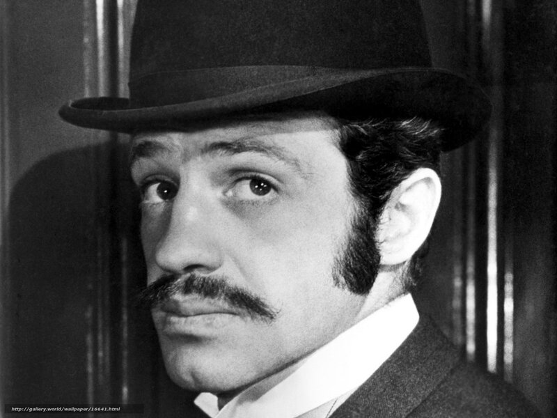 man with mustache and hat